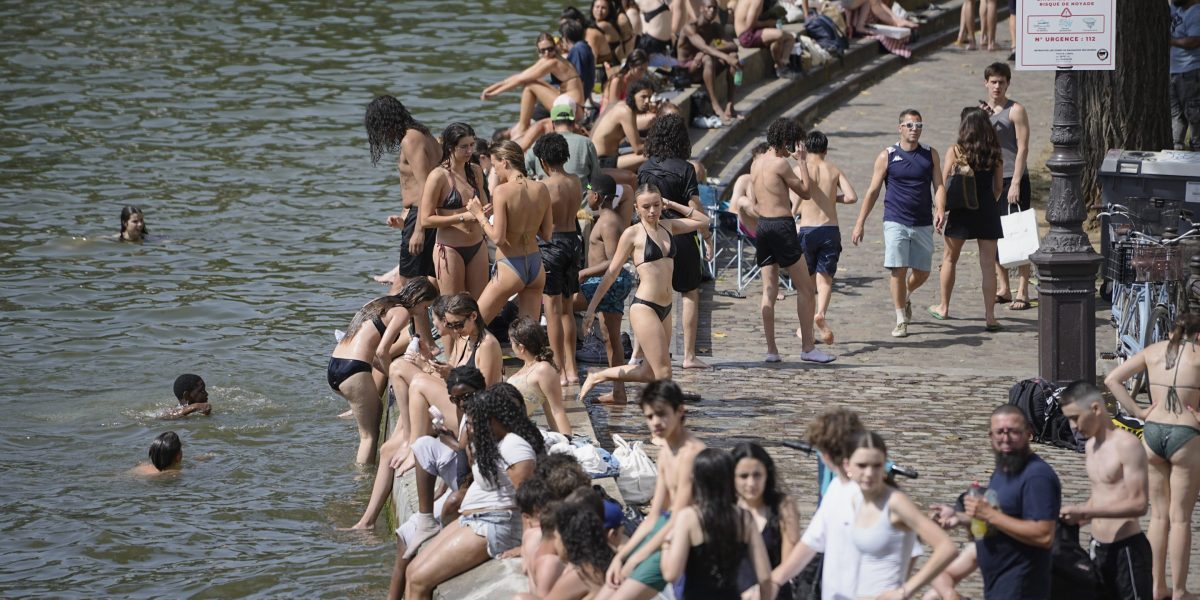 Paris leans on Seine-fed cooling system as heat strains the city