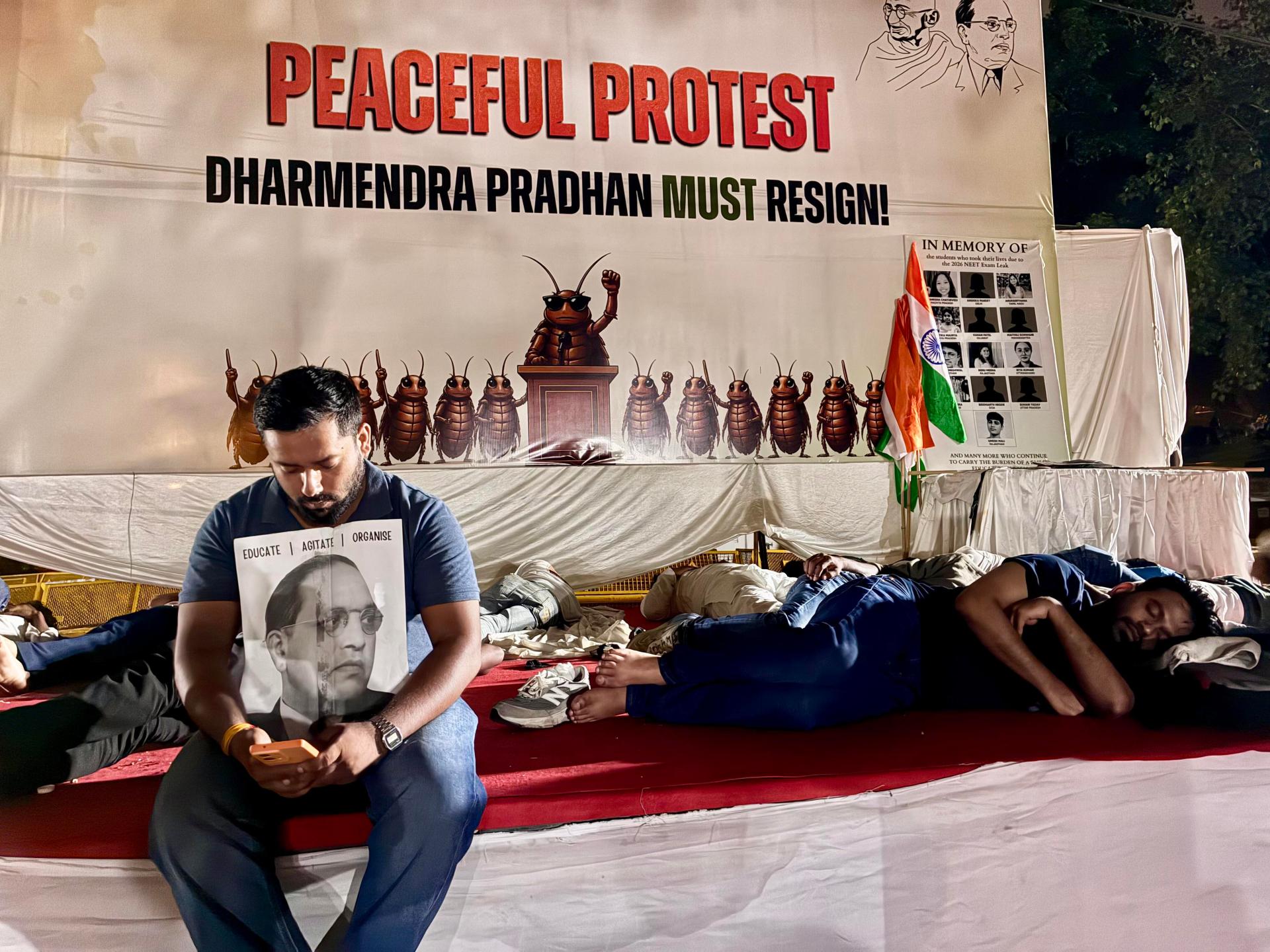 India student protest camp demands education minister quit