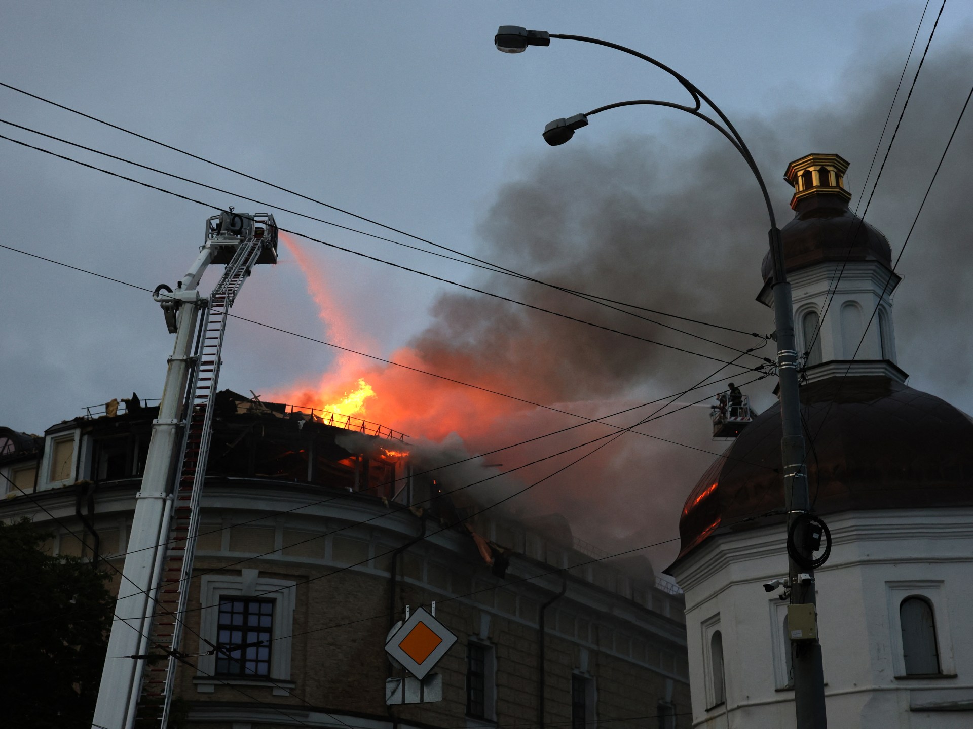 Russian barrage kills nine in Ukraine and burns Kyiv cathedral roof