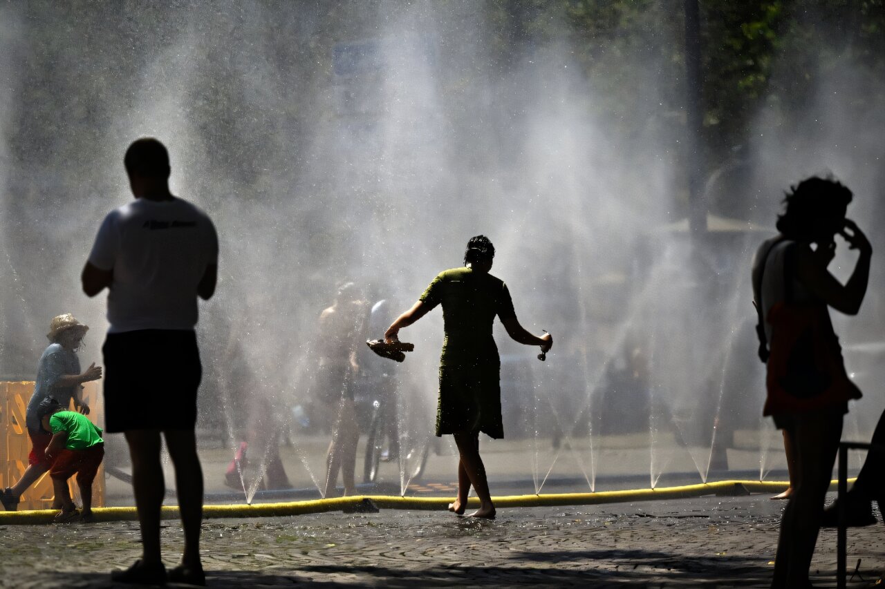 Germany logs provisional record heat of 41.3C as events are canceled