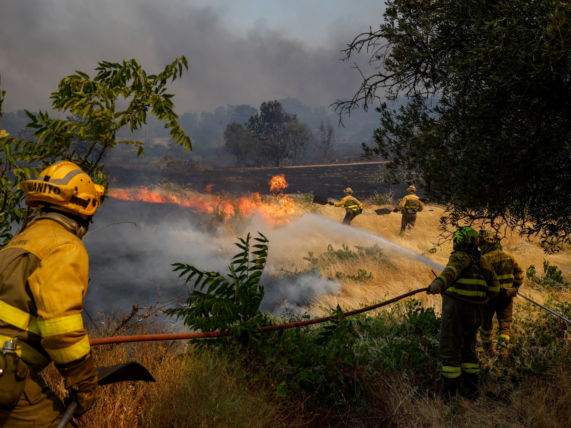 Spain wildfire evacuations widen as police arrest tractor driver