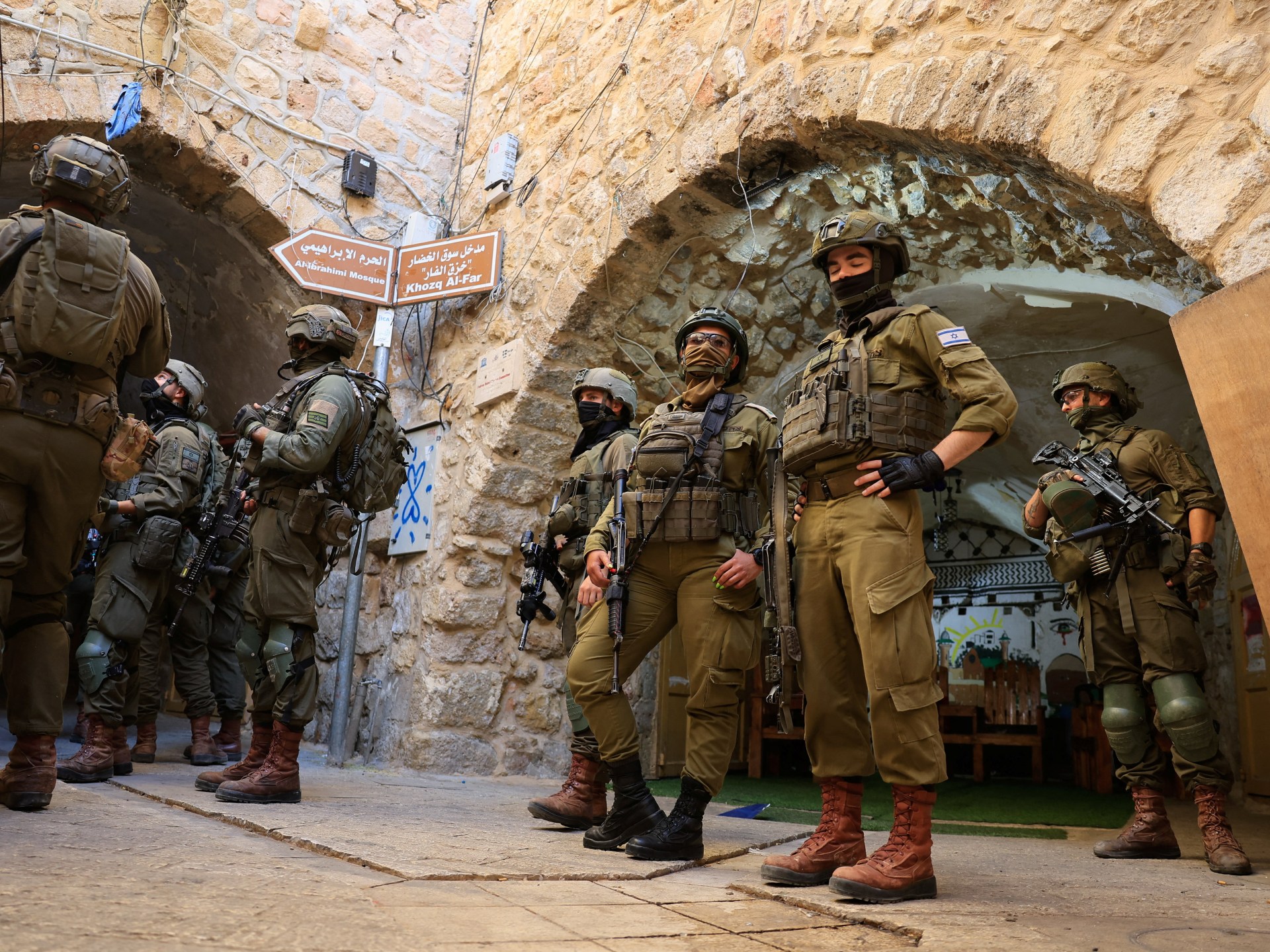 Six settlers charged over West Bank village and mosque attacks