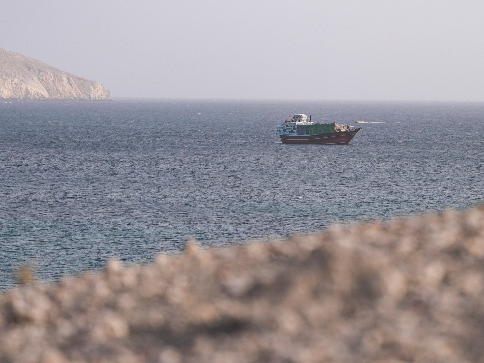 US strikes hit Iranian infrastructure as Bahrain sounds sirens