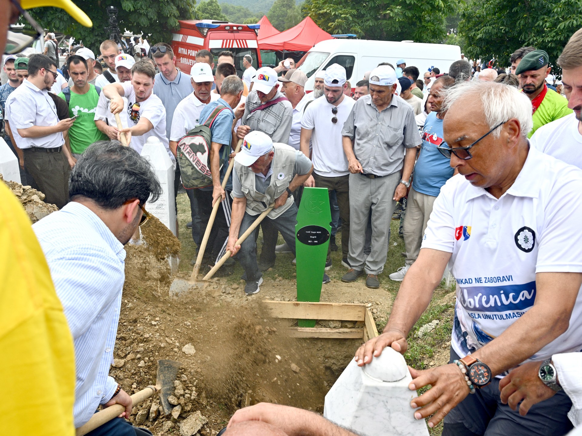 Thousands mark Srebrenica anniversary as 10 victims are buried