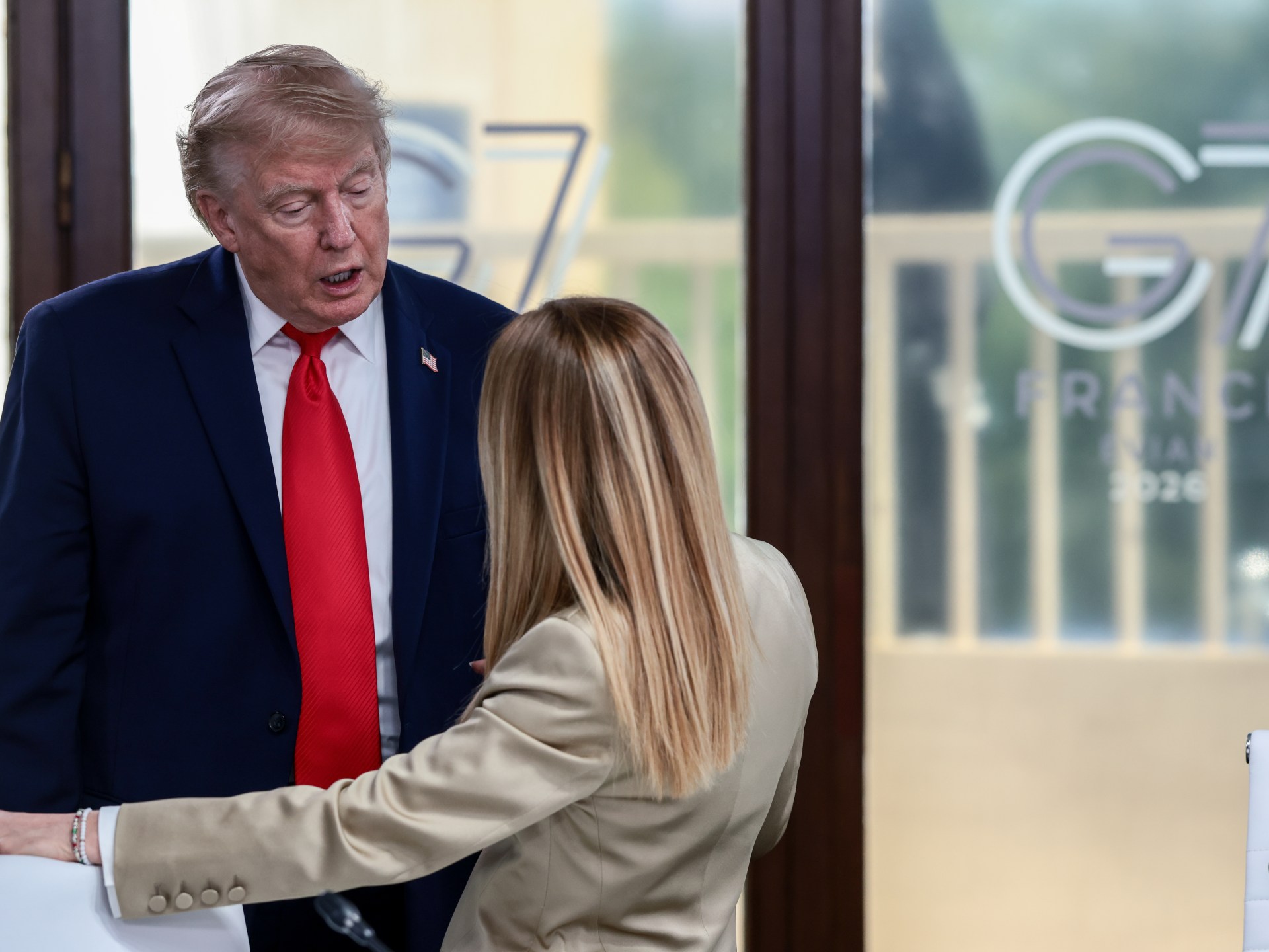Trump and Meloni trade accusations after G7 photo dispute