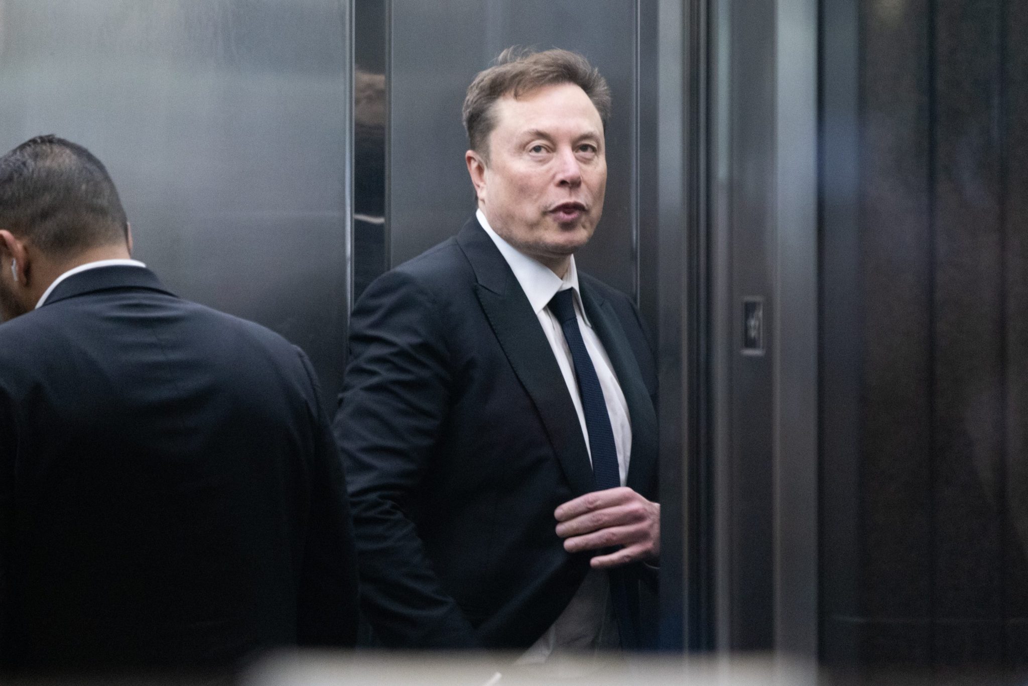Elon Musk says he may act on donate-fortune challenge