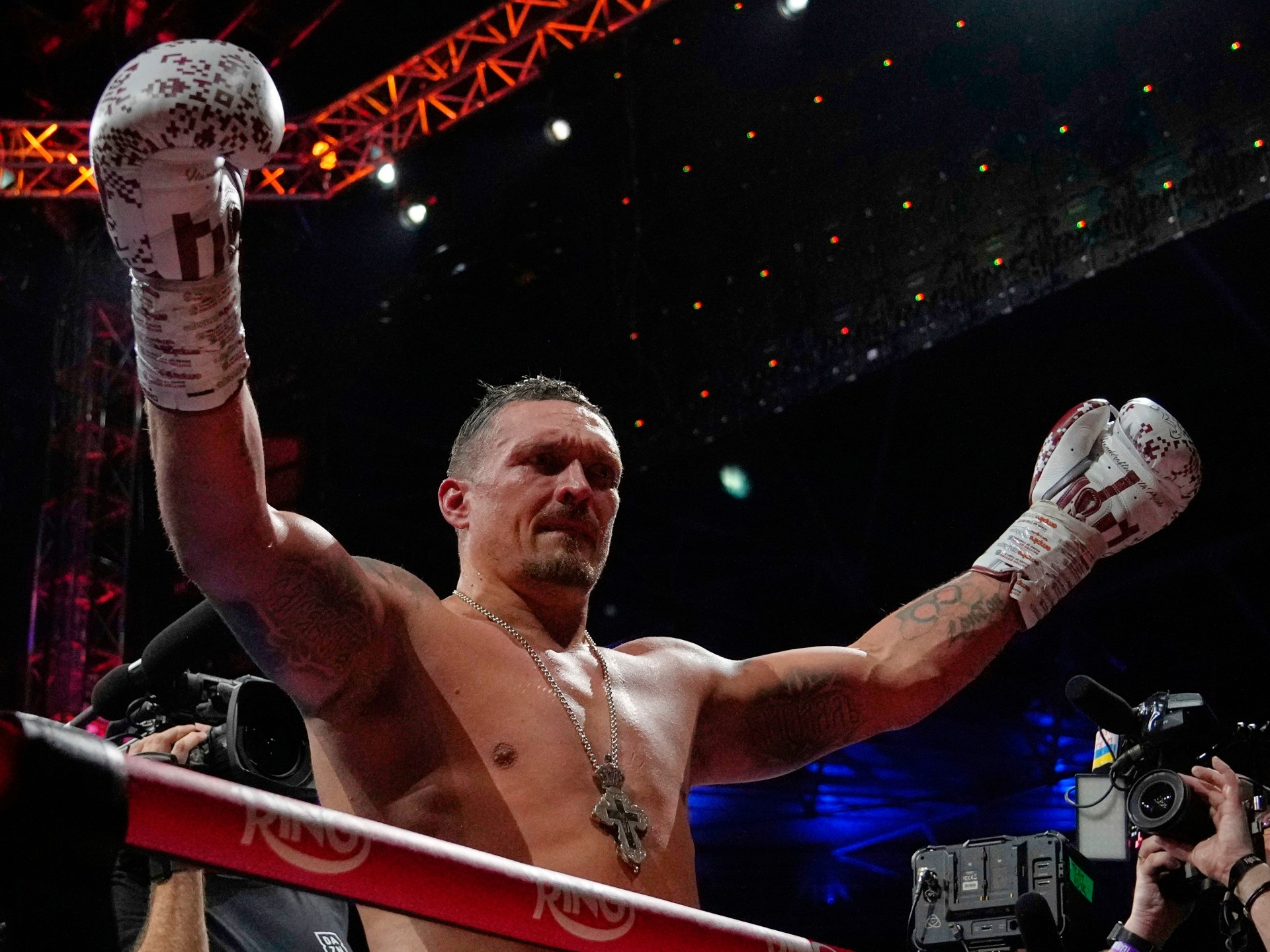 Oleksandr Usyk gives up heavyweight belts but says career will continue