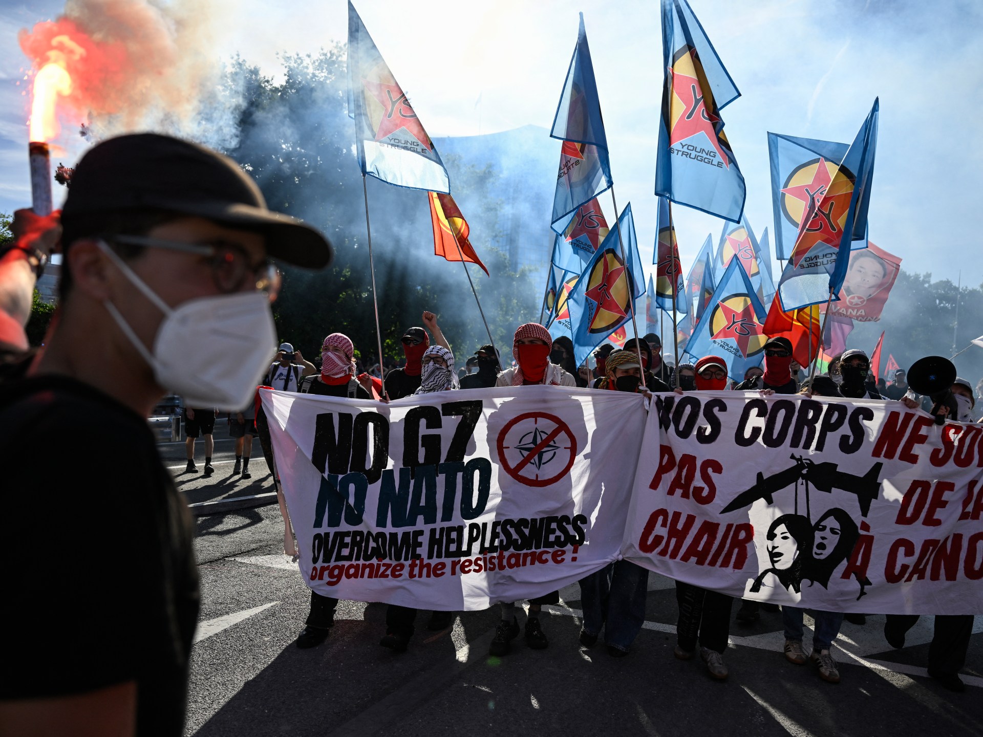 Geneva police use tear gas after G7 protest turns violent