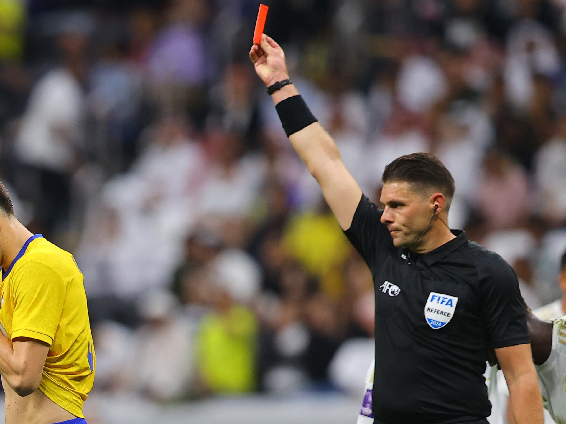 Racism monitor urges FIFA to drop VAR official over hand gesture