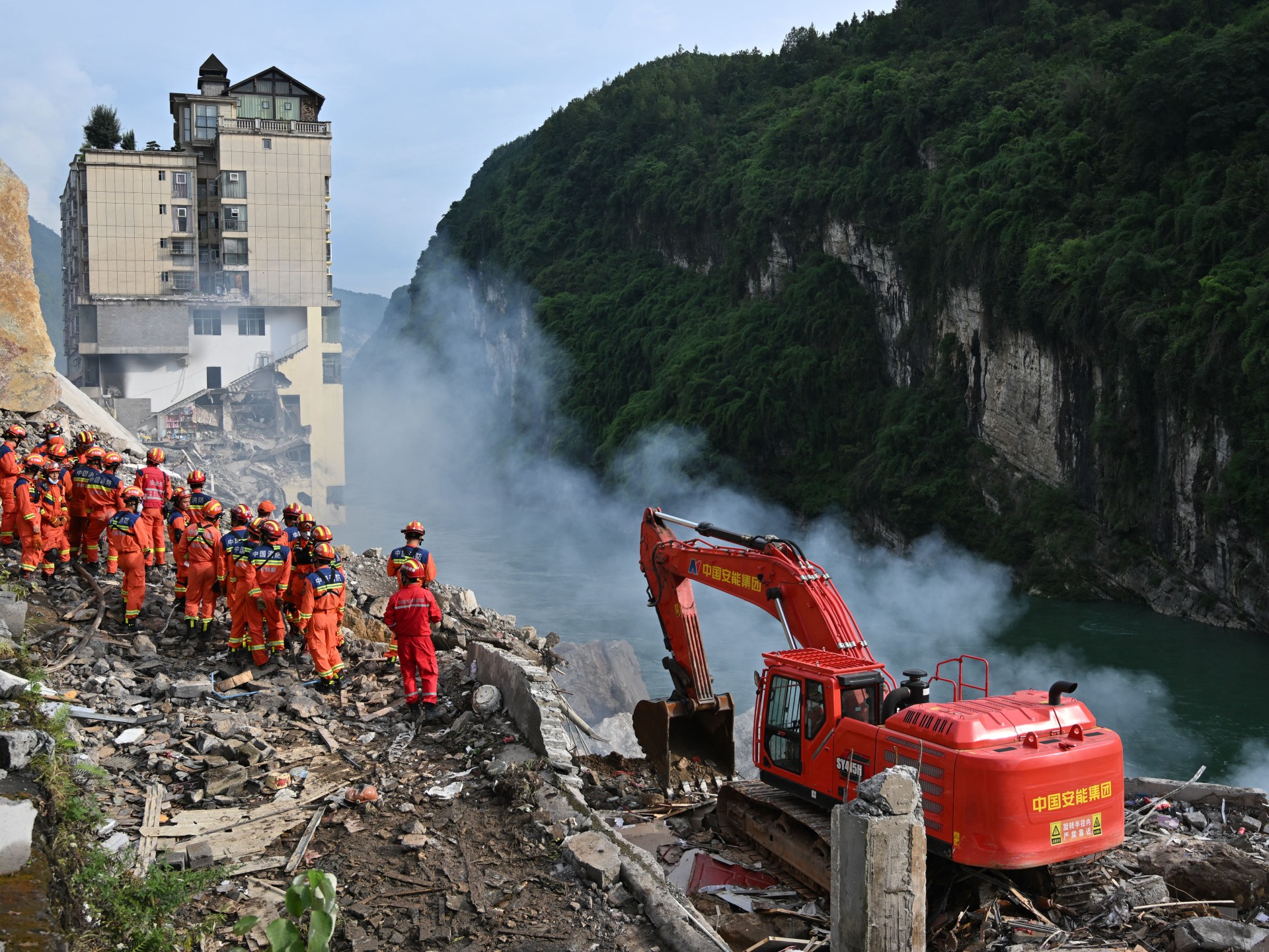 Landslide kills eight in Chongqing as rescuers search for 34 missing