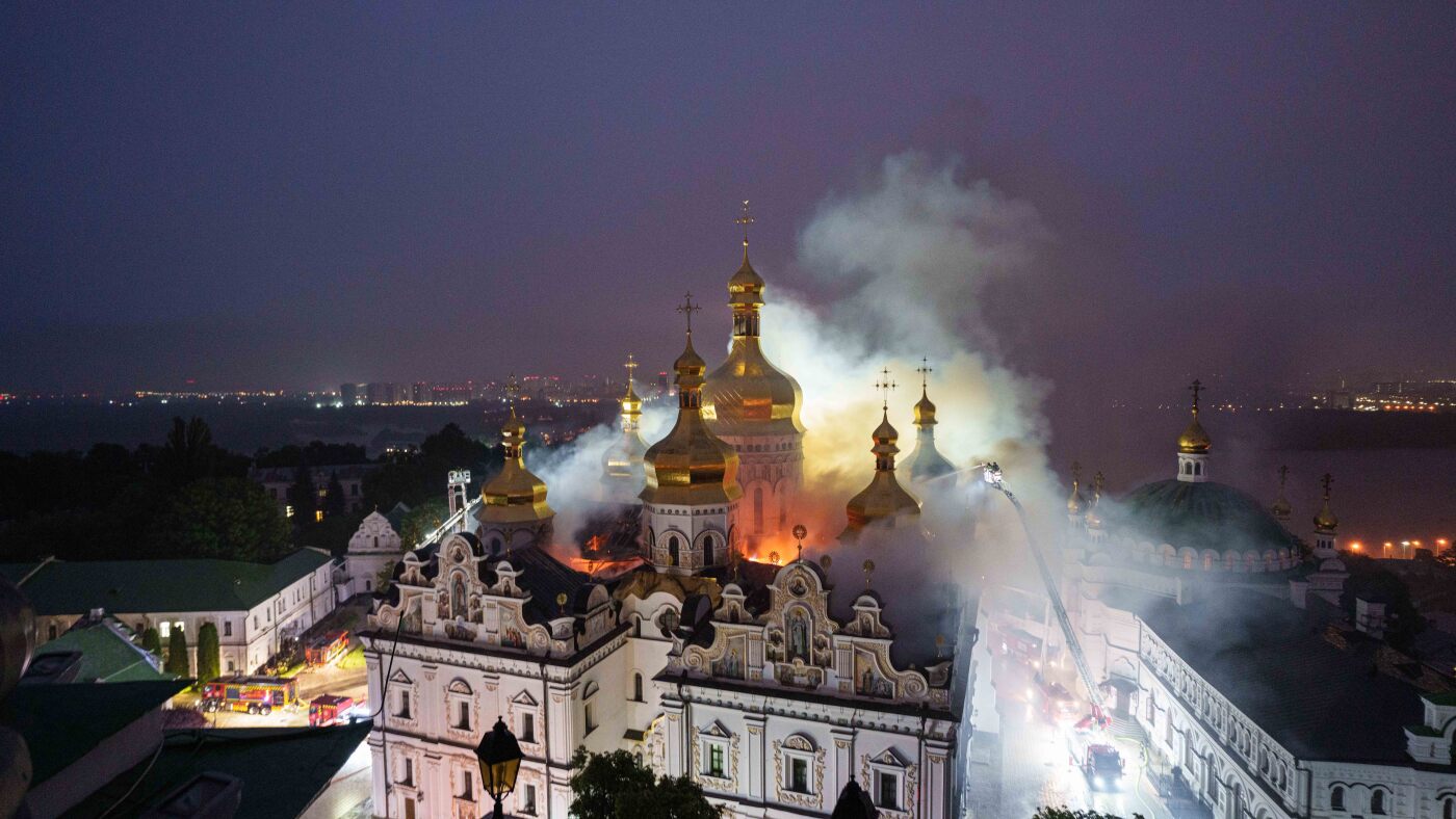 Russian strikes kill rescuers and damage Kyiv monastery