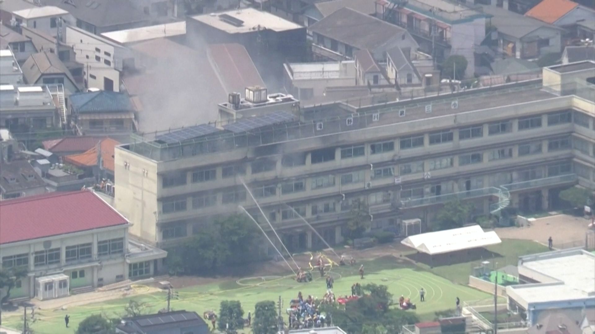 Children rescued from ledge during Tokyo school fire