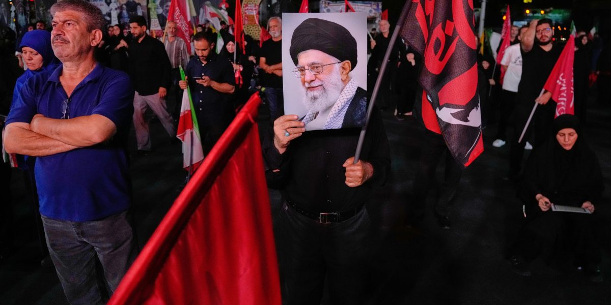 Iran says Hormuz is shut after warning shot at vessel