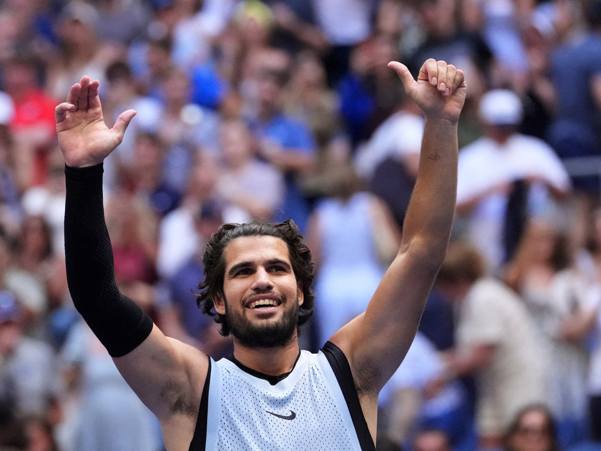 Alcaraz reaches US Open quarterfinals with straight-sets win over Paul