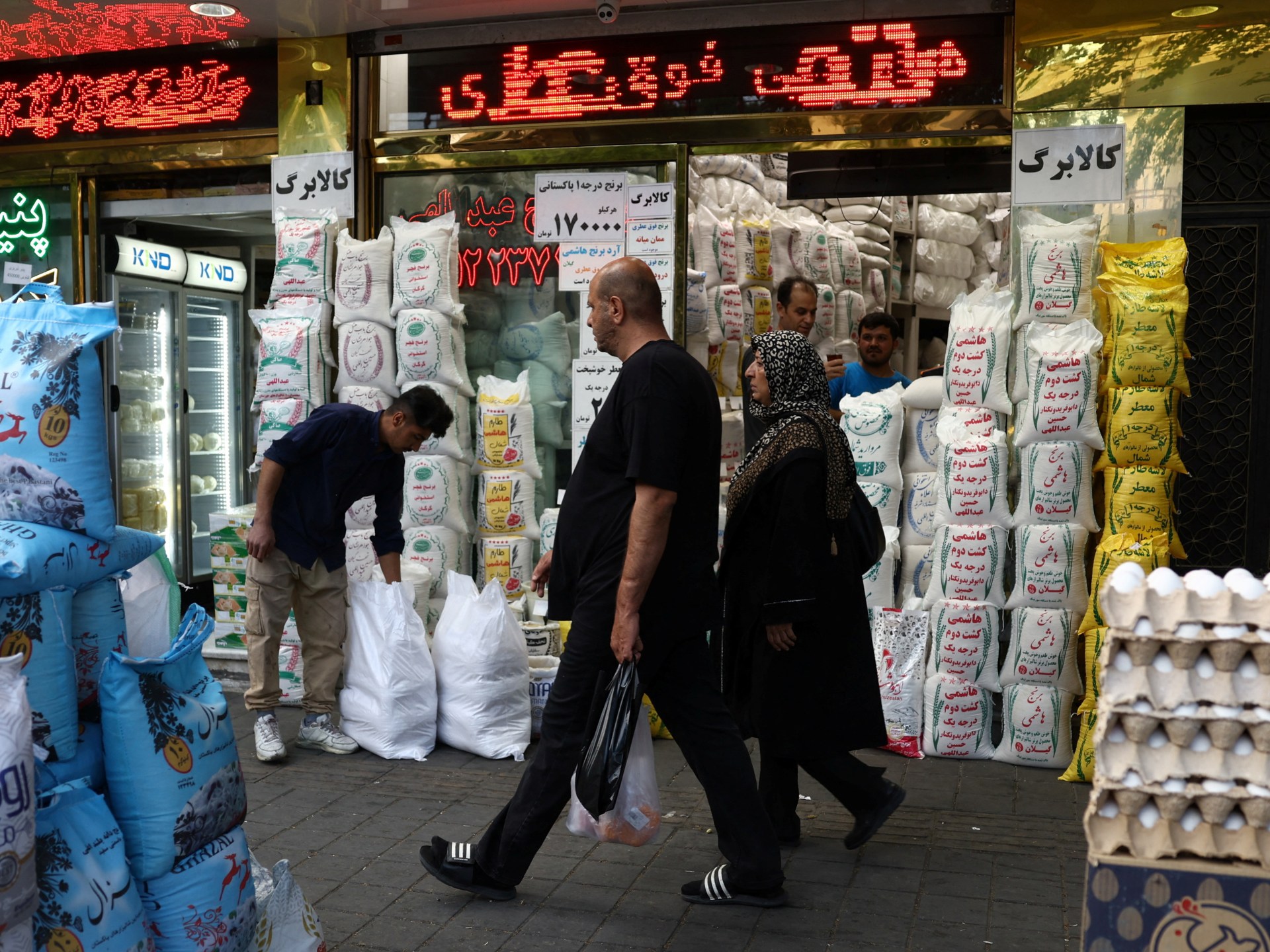 Iranians weigh relief and doubts after US deal opens oil sales
