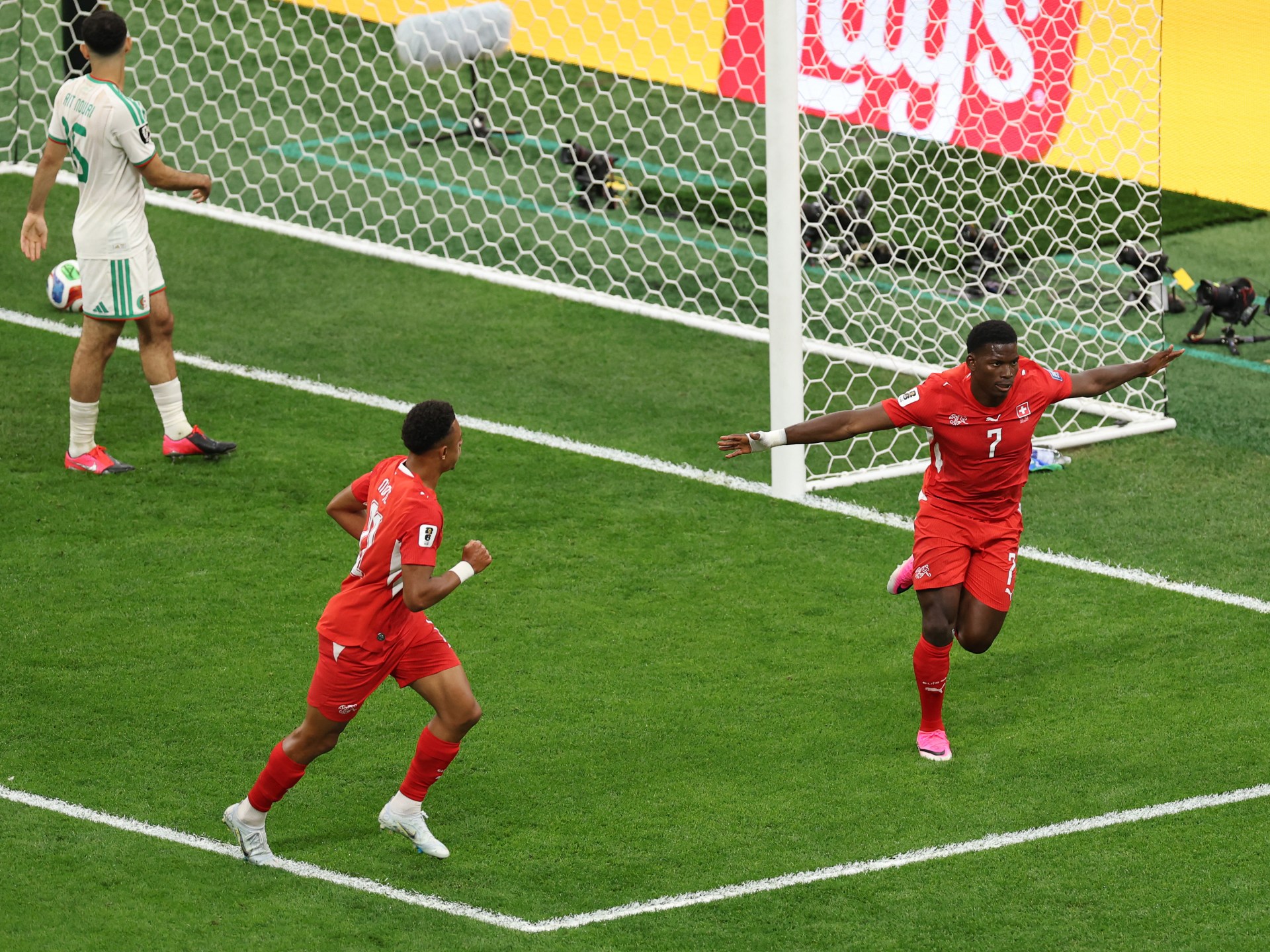 Switzerland advance after 2-0 World Cup win over Algeria