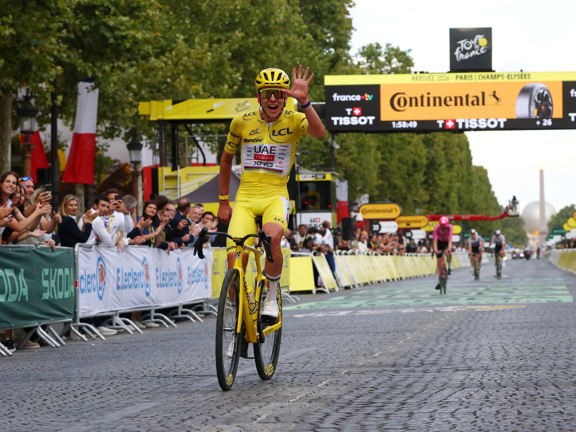 Pogacar wins Tour de France, matching record with fifth title