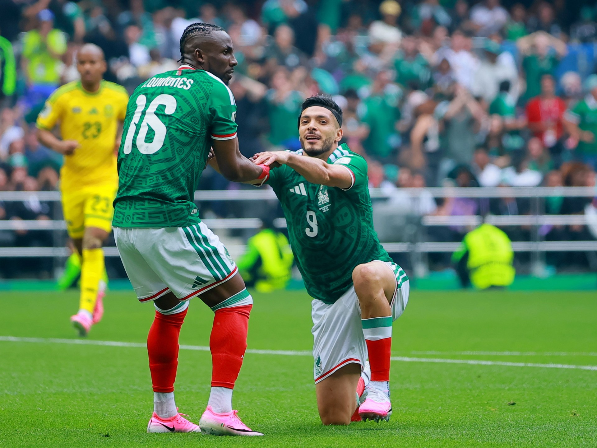 Quinones and Jimenez score as Mexico opens World Cup with win