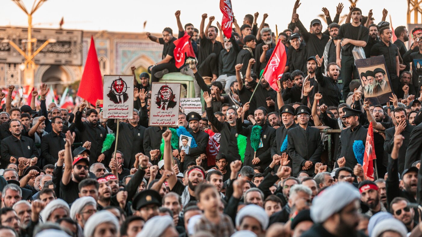 Trump threatens Iran after funeral chants target him