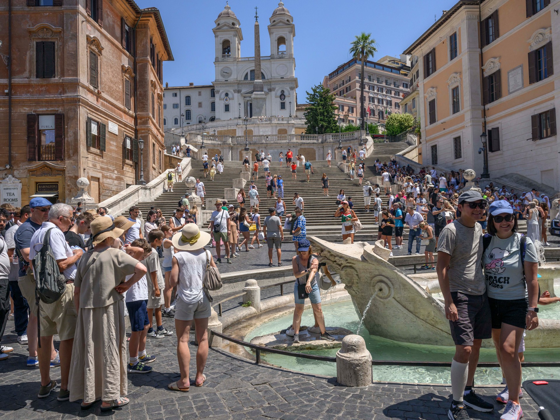 Heat warnings spread across Italy and Balkans as deaths mount