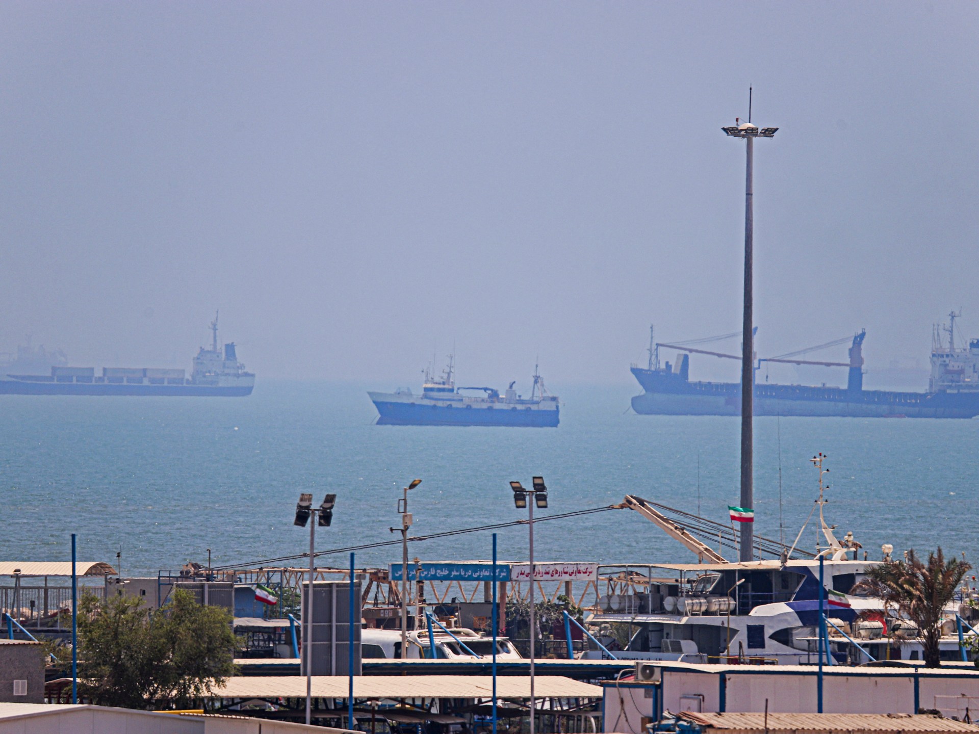 Strait of Hormuz evacuation paused after cargo ship is hit