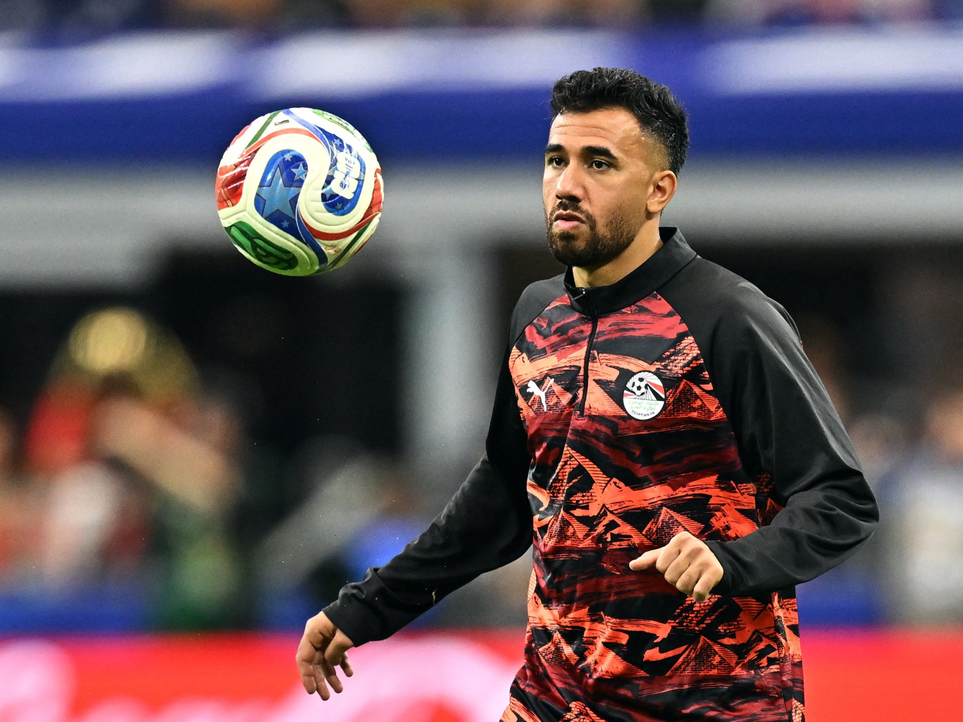 Egypt says Dallas officer shoved Trezeguet and team director at hotel