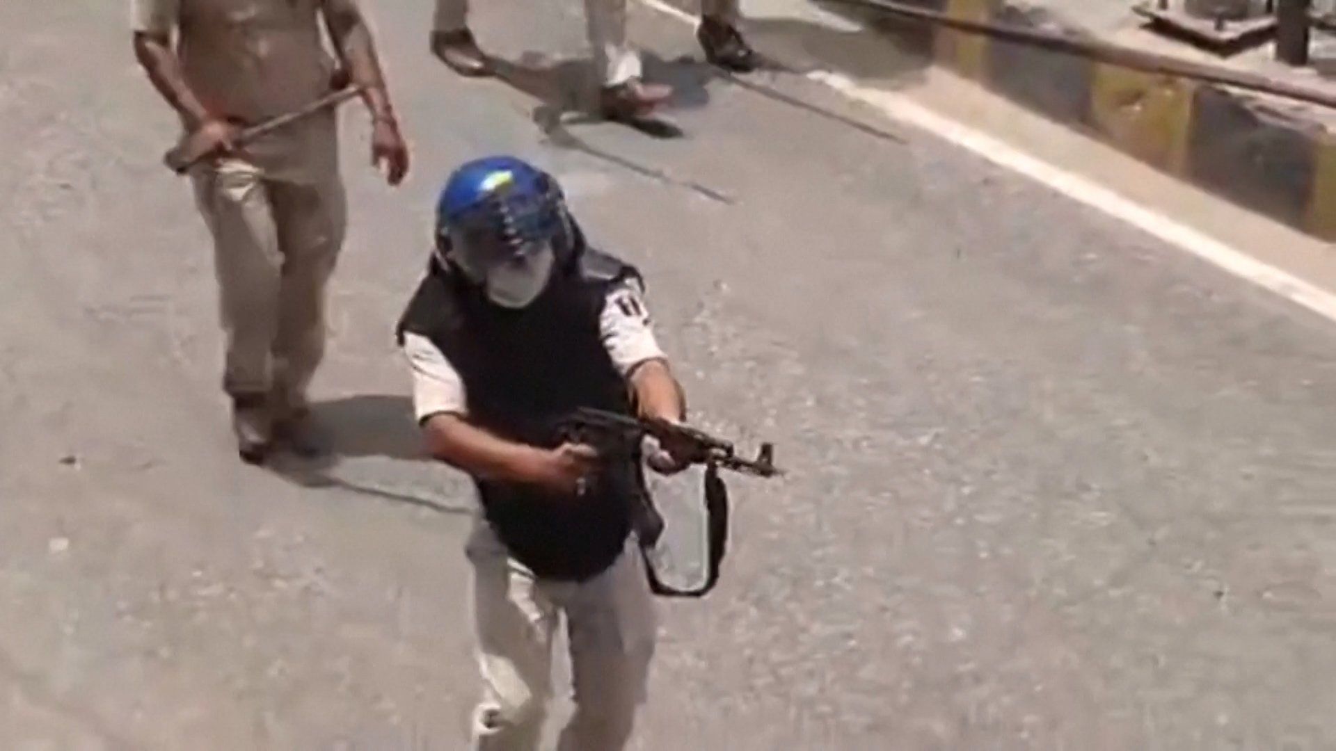 India police officer suspended over AK-47 fire at student protest