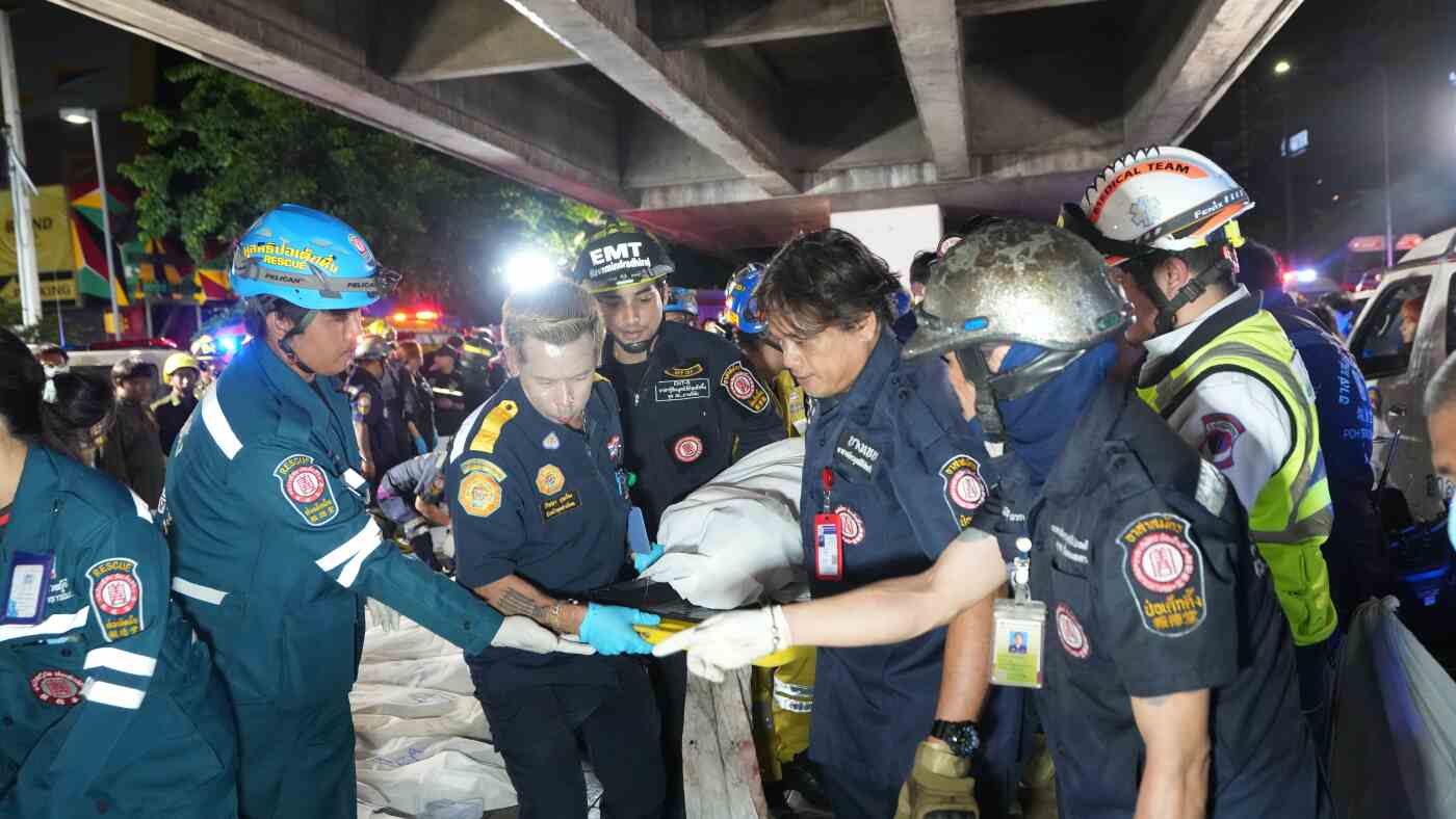 Bangkok pub fire kills at least 27 as cause is investigated